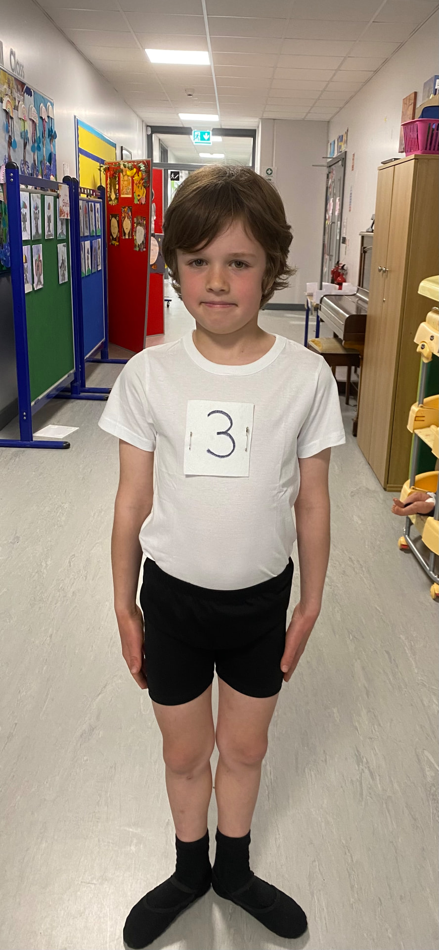 Young dancer preparing for ballet class